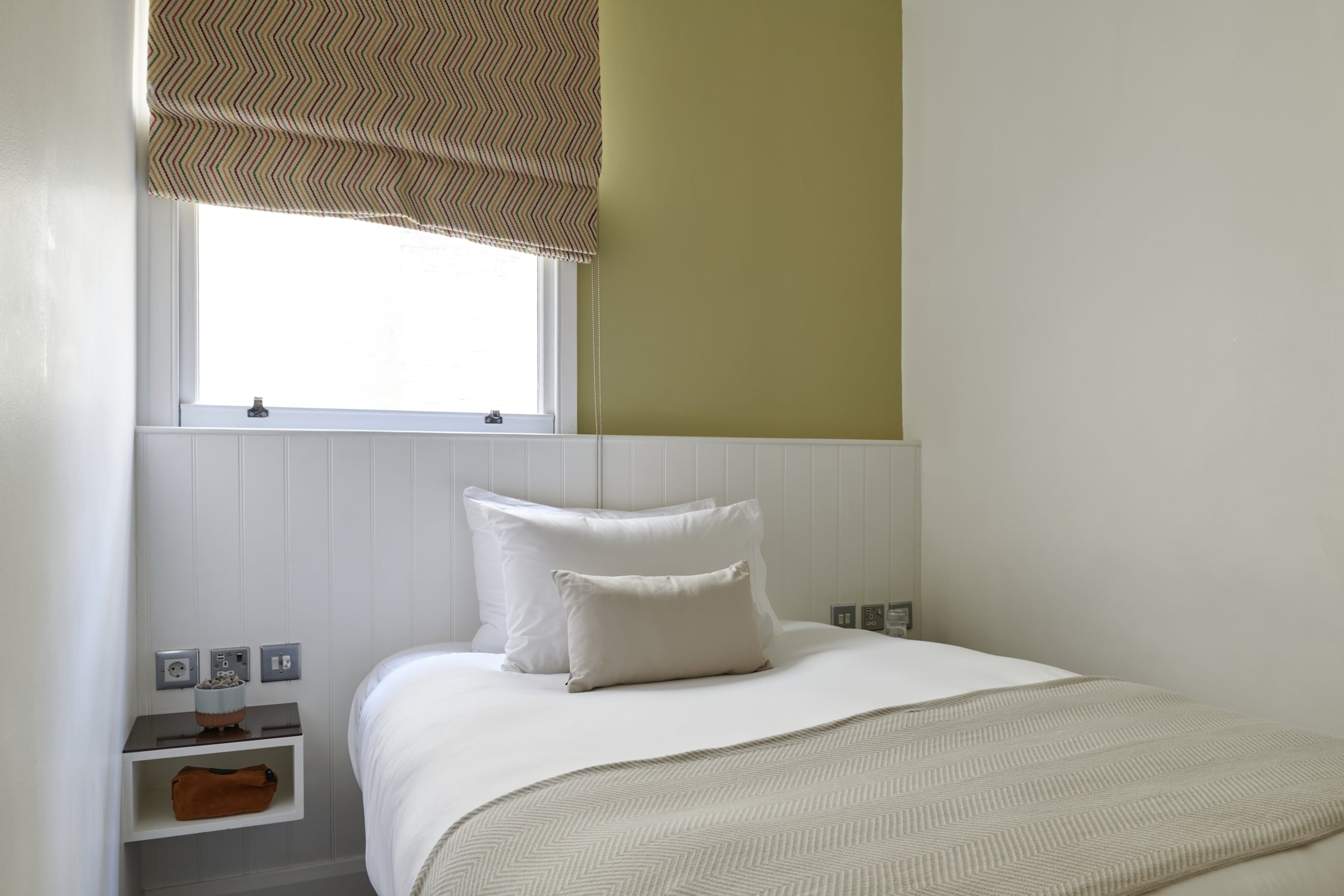 Superior single accommodation with floating night stand